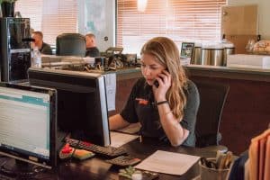 catering staff takes orders at Brothers BBQ Colorado