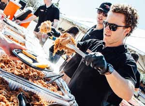 catering-for-wedding-serving-food Brothers BBQ Colorado